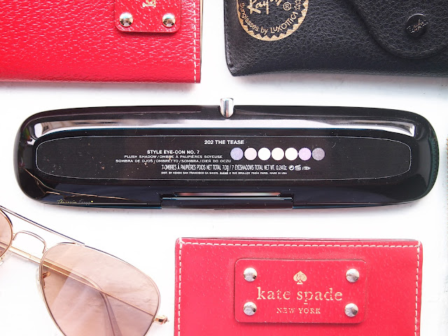 Marc Jacobs Beauty The Tease (202) Style Eye-Con No. 7 Plush Shadow Palette with seven eyeshadows in a purple theme.