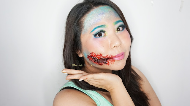 EASY HALLOWEEN MAKEUP TUTORIAL: HOW TO BE A MERMAID WITH MAKEUP AND FACE PAINT? How to look like a Mermaid with torn bloody lips for halloween. Special Effect makeup with some face painting for you who loves the scary, gory and bloody makeup for Halloween. Come and Join my Makeup and Hairdo Course to learn the technique with Theresia Feegy in Jakarta. Available for Personal Makeup Course, Advance Intense Pro Makeup Course, One Day Wedding Makeup Course and Basic Hairdo Course. For pricing and inquiries, kindly email to muses.wonderland@yahoo.com