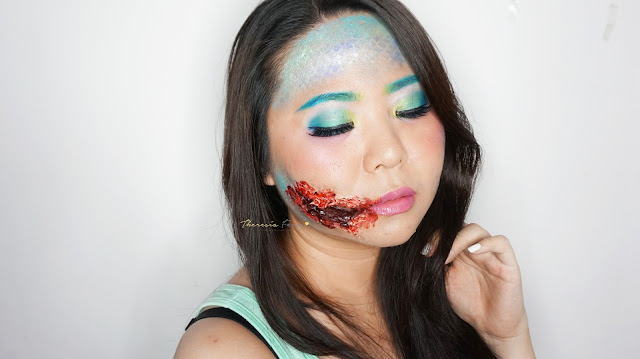 EASY HALLOWEEN MAKEUP TUTORIAL: HOW TO BE A MERMAID WITH MAKEUP AND FACE PAINT? How to look like a Mermaid with torn bloody lips for halloween. Special Effect makeup with some face painting for you who loves the scary, gory and bloody makeup for Halloween. Come and Join my Makeup and Hairdo Course to learn the technique with Theresia Feegy in Jakarta. Available for Personal Makeup Course, Advance Intense Pro Makeup Course, One Day Wedding Makeup Course and Basic Hairdo Course. For pricing and inquiries, kindly email to muses.wonderland@yahoo.com